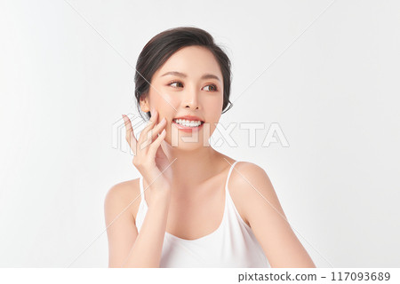 Beautiful young asian woman with clean fresh skin on white background, Face care, Facial treatment, Cosmetology, beauty and spa, Asian women portrait. Beautiful young asian woman with clean fresh skin on white background, Face care, Facial treatment, Cosmetology, beauty and spa, Asian women portrait. 117093689