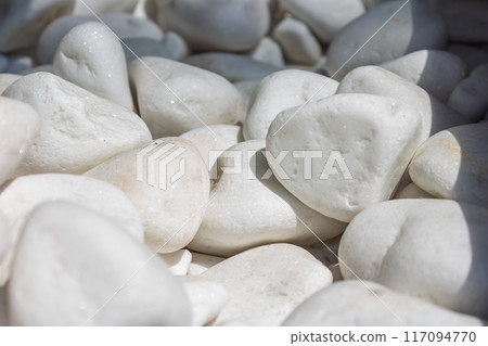 Decorative stones in the rays of sunlight Decorative stones in the rays of sunlight 117094770