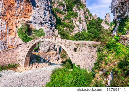 Zagori, Greece. Kokkorou Bridge, Vikos Aoos canyon region in Pindus Mountains, North Greece. 117095441