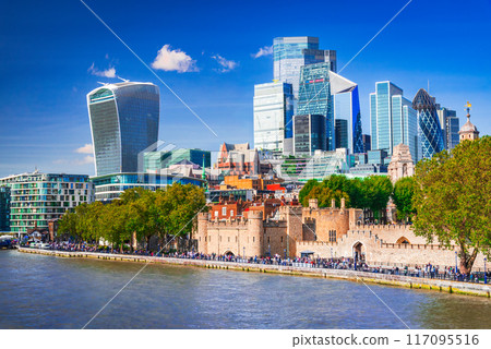 London, United Kingdom. Skyline view of the famous City of London skyscrapers and Thames River. 117095516