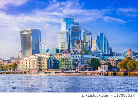 London, United Kingdom. Skyline view of the famous City of London, Thames River. 117095527