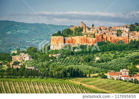 Orvieto, Italy. Historical hilltop old town of Orvieto, tuff city, view of the medieval walls and towers. Orvieto, Italy. Historical hilltop old town of Orvieto, tuff city, view of the medieval walls and towers. 117095650