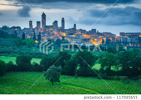San Gimignano, Italy. Blue hour picturesque view of medieval hilltop town, Tuscany. San Gimignano, Italy. Blue hour picturesque view of medieval hilltop town, Tuscany. 117095655