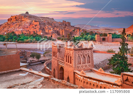 Ait-Benhaddou, Morocco. Medieval clay fortified city in North Africa, Atlas Mountain range in the background. 117095808
