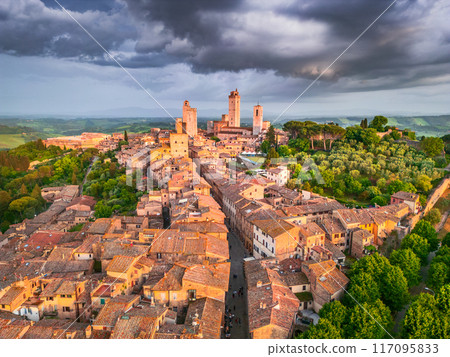 San Gimignano, Italy. Picturesque aerial view of medieval city in Tuscany. San Gimignano, Italy. Picturesque aerial view of medieval city in Tuscany. 117095833