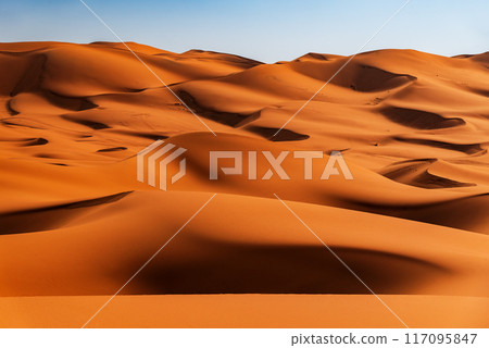 Merzouga, Morocco. Sand dunes in the Sahara Desert, North Africa - Erg Chebbi dunes. Merzouga, Morocco. Sand dunes in the Sahara Desert, North Africa - Erg Chebbi dunes. 117095847