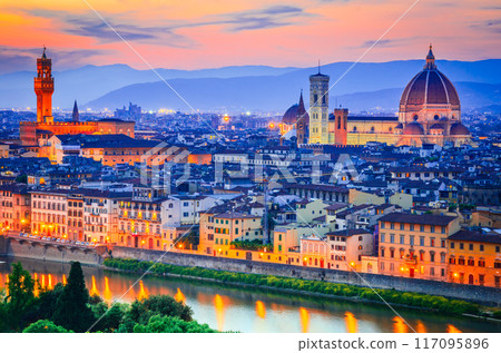 Tuscany, Italy - Florence skyline with Arno River and Palazzo Vecchio. 117095896