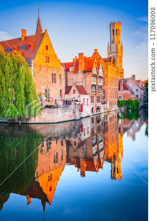 Bruges, Belgium. Rozenhoedkaai in sunrise light, old town with Belfry water reflection 117096008