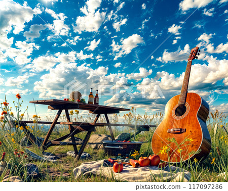 Picnic table with guitar and picnic table with picnic table in the background. 117097286