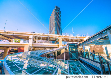 Yokohama cityscape in Japan: The roof of the station plaza in front of the west exit of Yokohama Station comes into view... In the background is The Yokohama Front (August 4th) Yokohama cityscape in Japan: The roof of the station plaza in front of the west exit of Yokohama Station comes into view... In the background is The Yokohama Front (August 4th) 117097952
