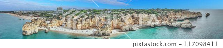 Panoramic drone picture over Praia do Marinha beach in Portuguese Algarve during daytime Panoramic drone picture over Praia do Marinha beach in Portuguese Algarve during daytime 117098411