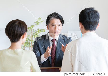 A businessman who works for a married couple 117099281