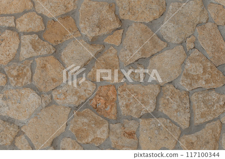 Brown rough stone texture pattern abstract solid wall background rock grunge backdrop surface mosaic 117100344