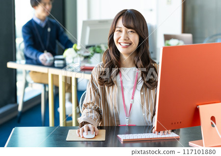 Young female engineer working in an office Young female engineer working in an office 117101880