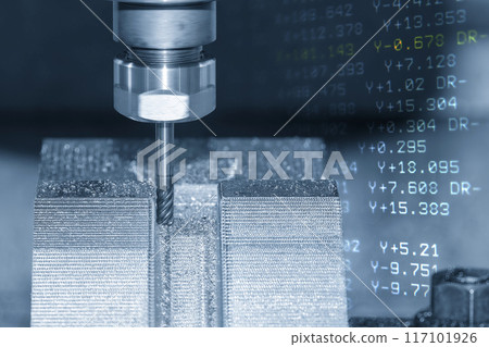 Abstract scene the CNC milling machine cutting mold part and G-code data back ground. Abstract scene the CNC milling machine cutting mold part and G-code data back ground. 117101926