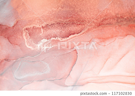 A close-up photograph showcasing abstract art in shades of blush pink and white. The flowing ink creates a gentle swirl of color 117102830