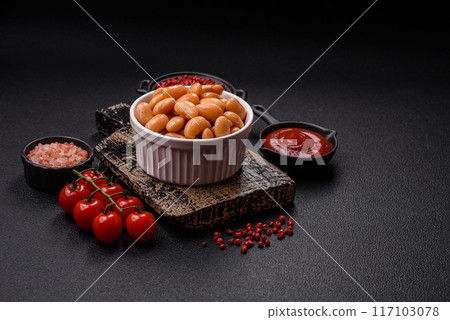 Delicious nutritious canned beans in tomato, with salt and spices Delicious nutritious canned beans in tomato, with salt and spices 117103078