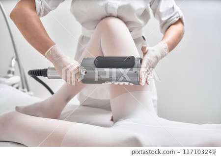 Professional Treatment Session With a Client in a Modern Spa Setting Focused on Skin Care Techniques Professional Treatment Session With a Client in a Modern Spa Setting Focused on Skin Care Techniques 117103249