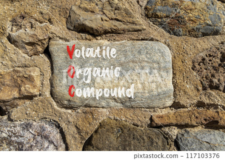 VOC volatile organic compound symbol. Concept words VOC volatile organic compound on beautiful big stone. Beautiful stone wall background. Business VOC volatile organic compound concept. Copy space. 117103376