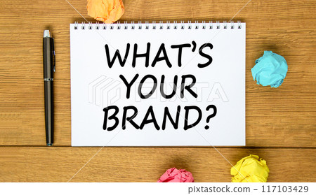 Branding what is your brand symbol. Concept words What is your brand on beautiful white note. Beautiful wooden background. Black pen. Paper. Business branding what is your brand concept. Copy space. Branding what is your brand symbol. Concept words What is your brand on beautiful white note. Beautiful wooden background. Black pen. Paper. Business branding what is your brand concept. Copy space. 117103429