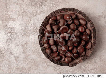 fresh chestnuts, in a wooden bowl, top view, no people, fresh chestnuts, in a wooden bowl, top view, no people, 117104053