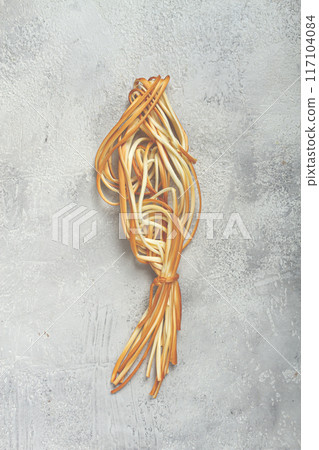 smoked chechil cheese, rope cheese, suluguni, Javakheti cheese, Georgian cuisine, top view, no people, 117104084