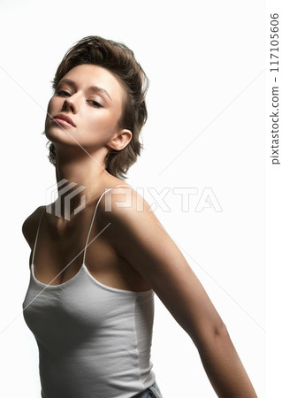 beautiful young woman with short haircut. sexy girl in white shirt 117105606