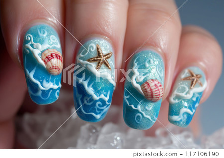 Close-up of a hand showcasing detailed ocean-themed nail art with waves, seashells, and starfish designs 117106190