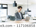 Japanese male businessman (operating a PC) 117106858