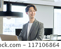 Japanese male businessman (talking to a colleague) 117106864