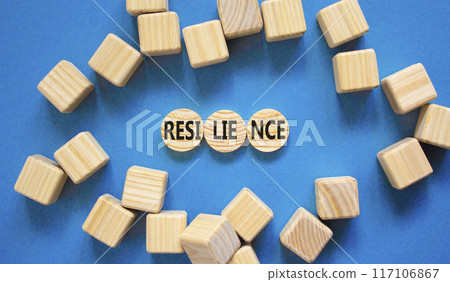 Resilience symbol. Concept word Resilience on beautiful wooden circles. Beautiful blue table blue background. Wooden cubes. Business resilience concept. Copy space. Resilience symbol. Concept word Resilience on beautiful wooden circles. Beautiful blue table blue background. Wooden cubes. Business resilience concept. Copy space. 117106867