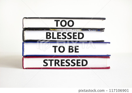 Too blessed to be stressed symbol. Concept words Too blessed to be stressed on books on a beautiful white table white background. Psychological and too blessed to be stressed concept. Copy space. 117106901