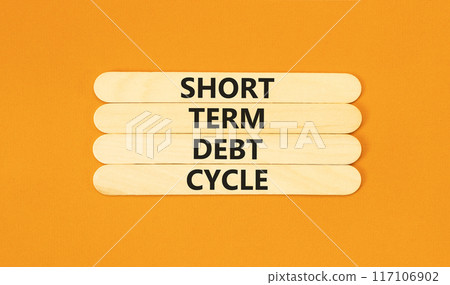 Short term debt cycle symbol. Concept words Short term debt cycle on wooden stick. Beautiful orange table orange background. Business Short term debt cycle concept. Copy space. 117106902