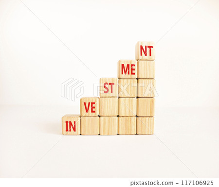 Investment symbol. Concept word Investment on beautiful wooden blocks. Beautiful white background. Business investment concept. Copy space. 117106925