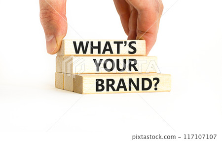 Branding and what is your brand symbol. Concept words What is your brand on beautiful blocks. Beautiful white background. Businessman hand. Business branding what is your brand concept. Copy space. Branding and what is your brand symbol. Concept words What is your brand on beautiful blocks. Beautiful white background. Businessman hand. Business branding what is your brand concept. Copy space. 117107107