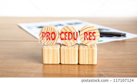 Procedures symbol. Concept word Procedures on beautiful wooden circles. Beautiful wooden table white background. Black pen. White document. Business procedures concept. Copy space. 117107124
