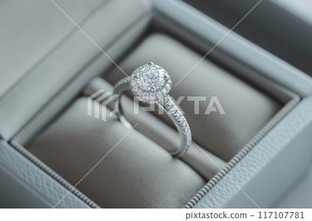 Elegant diamond engagement ring in luxurious box 117107781