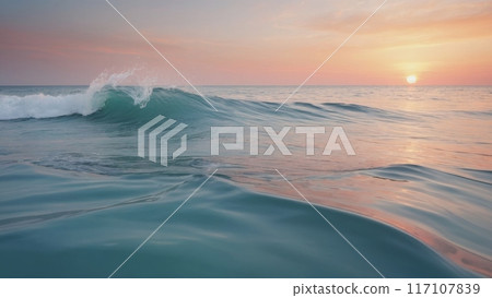 Pastel colors of calm radiant sea waves at sunset. 117107839