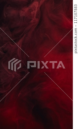 Dark mist flow. Ink water blend. Defocused red black color dust particles floating vapor cloud texture swirl abstract art background. 117107883