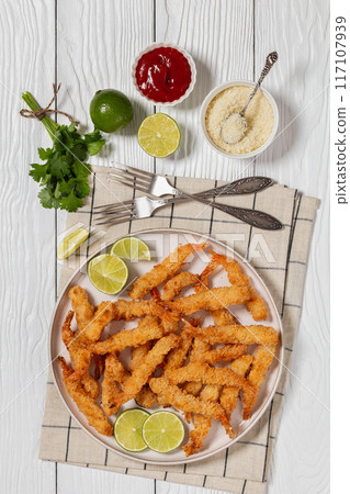 deep fried panko breaded shrimp on a plate 117107939