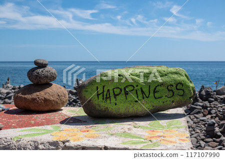 Pebble Happiness on a beach, Madeira, Portugal Pebble Happiness on a beach, Madeira, Portugal 117107990