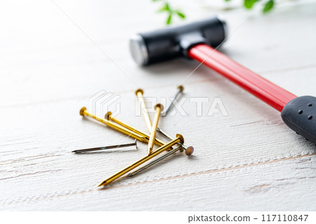 Hammer and nail 117110847