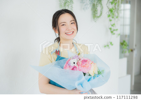 A woman making a bouquet A woman making a bouquet 117111298