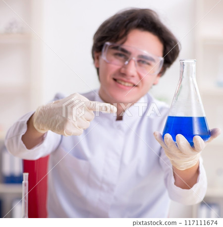 Young male biochemist working in the lab Young male biochemist working in the lab 117111674