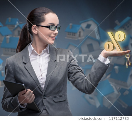 Businesswoman in housing mortgage concept 117112783