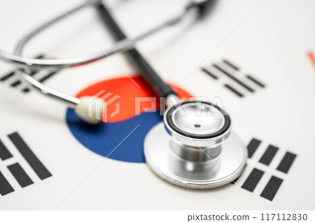 Stethoscope on South Korea flag, Business and finance. Stethoscope on South Korea flag, Business and finance. 117112830