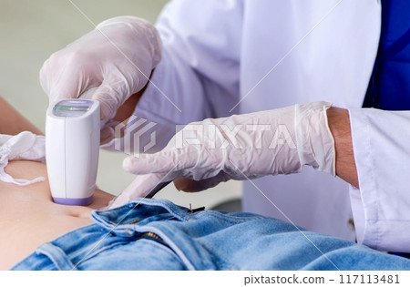 Pregnant woman visiting radiologyst for ultrasound Pregnant woman visiting radiologyst for ultrasound 117113481