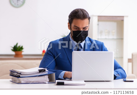 Young male employee in self-quarantine concept Young male employee in self-quarantine concept 117113658