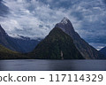 Mitre Peak as seen from the shore of Milford Sound in New Zealand 117114329