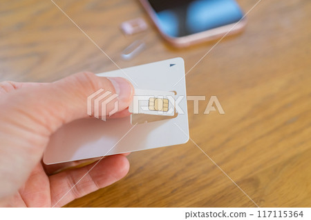 Separate the multi-cut SIM card from the backing 117115364